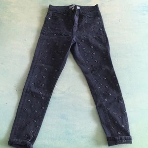 Black faded skinny jeans with embellishments